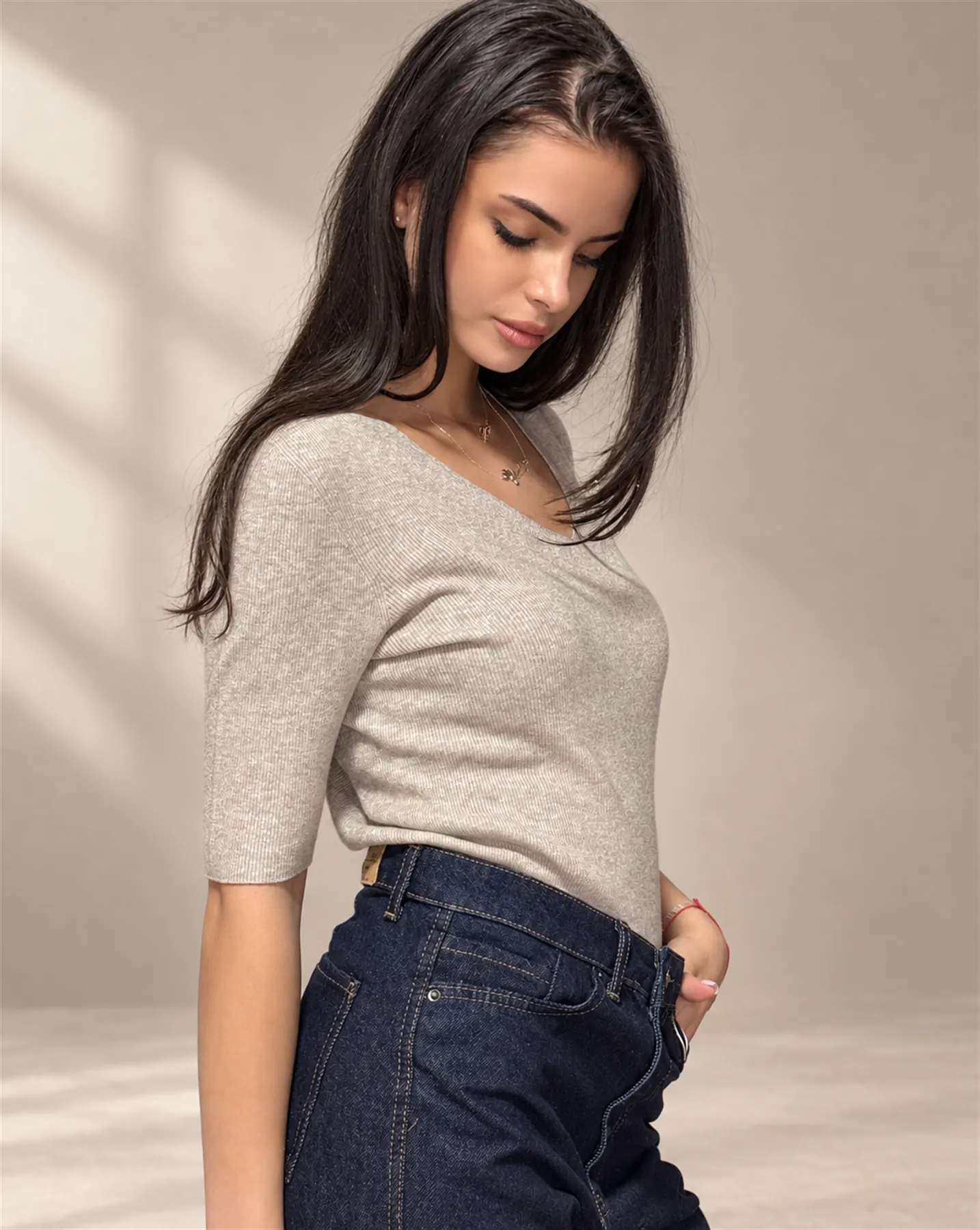 The Brooch V-Knit in Ecru, Three-quarter