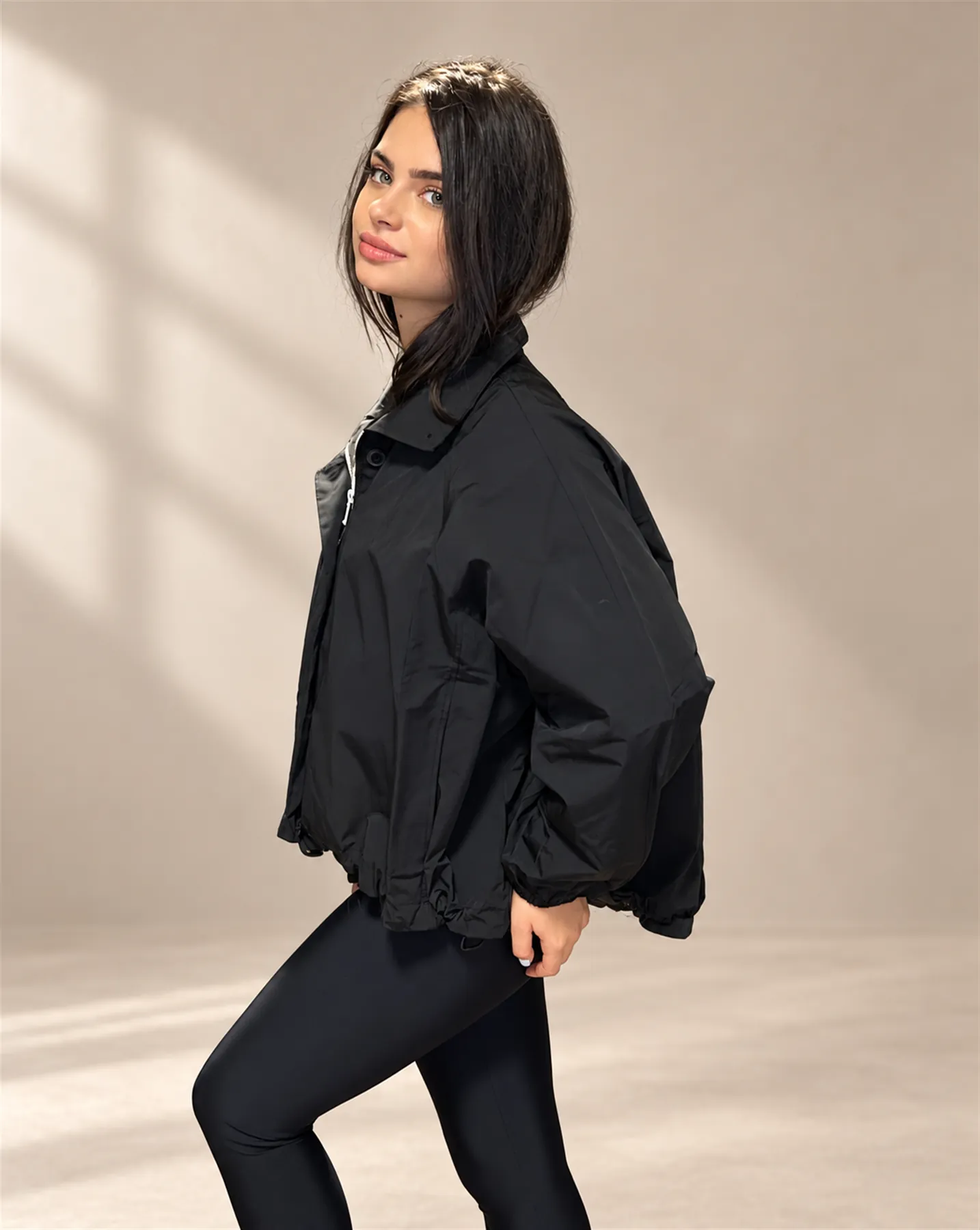 The Button Jacket in Black, Over the shoulder