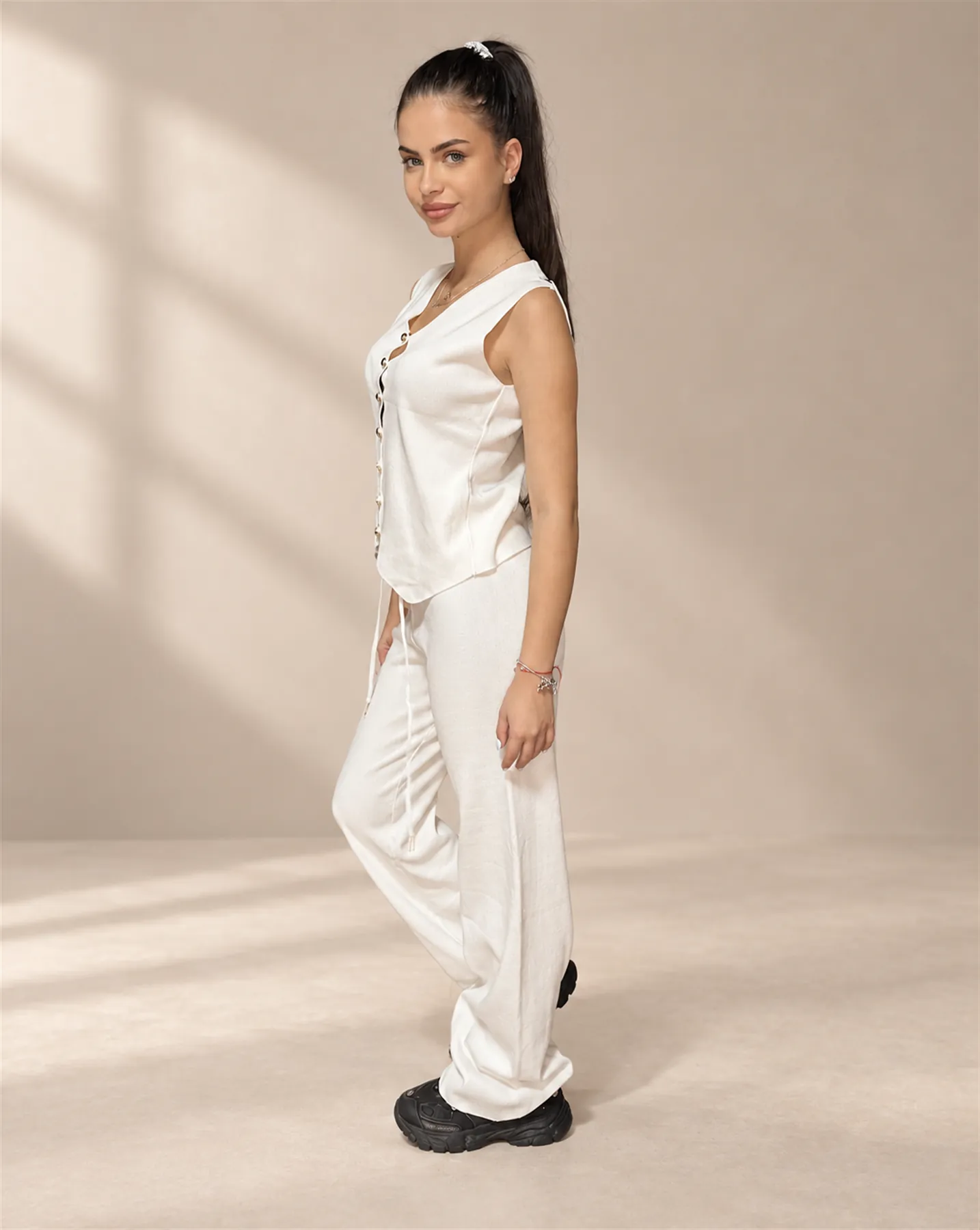 The Button Vest Set in White, Over the shoulder