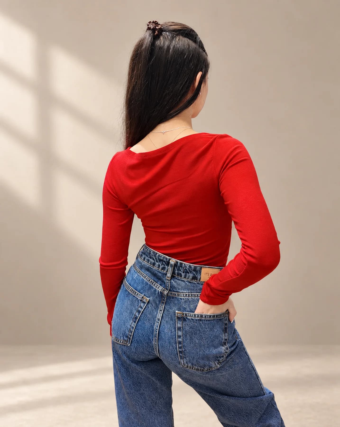 The Second-Skin Top in Cherry, Over the shoulder
